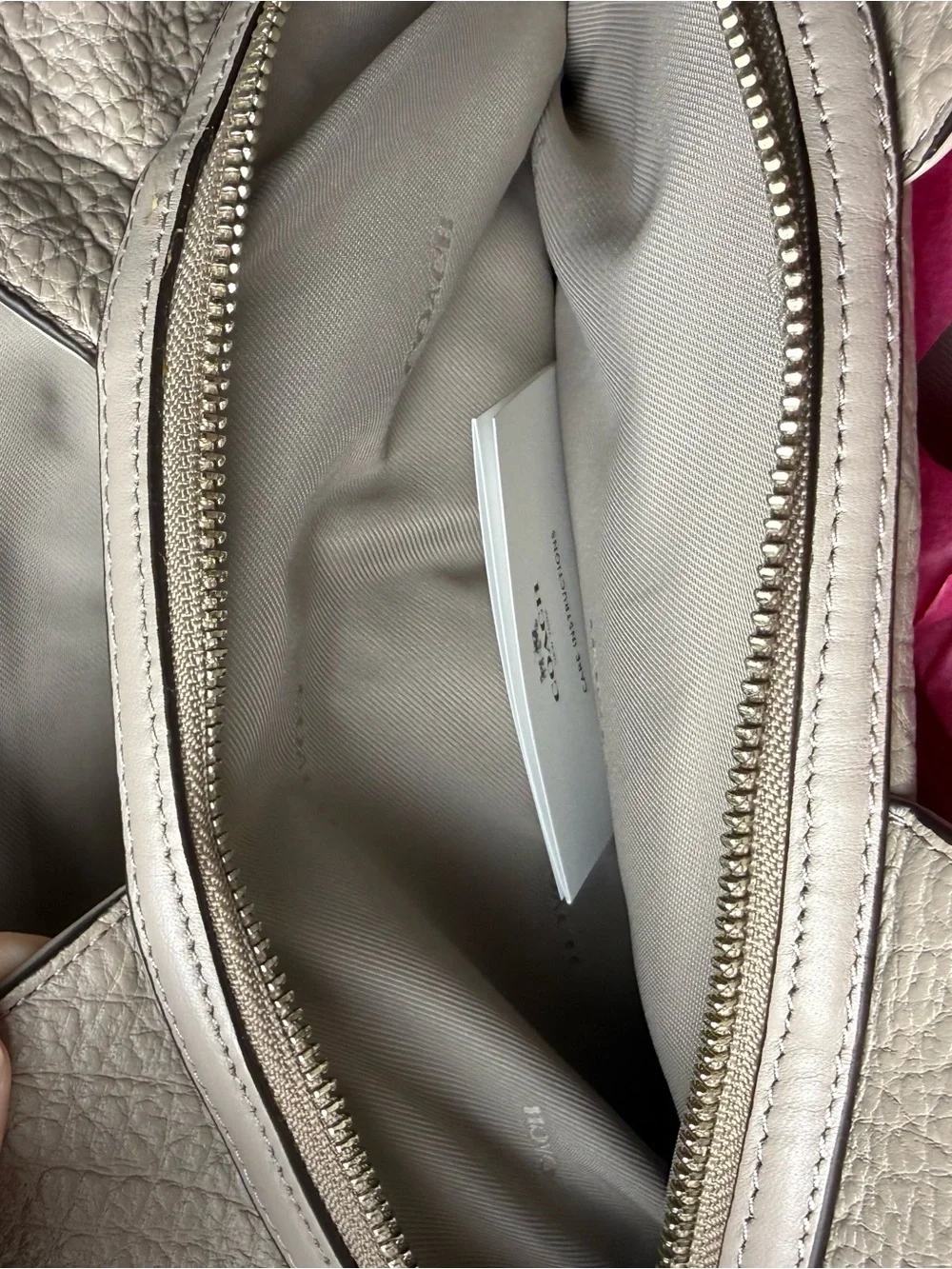 Coach sleek leather